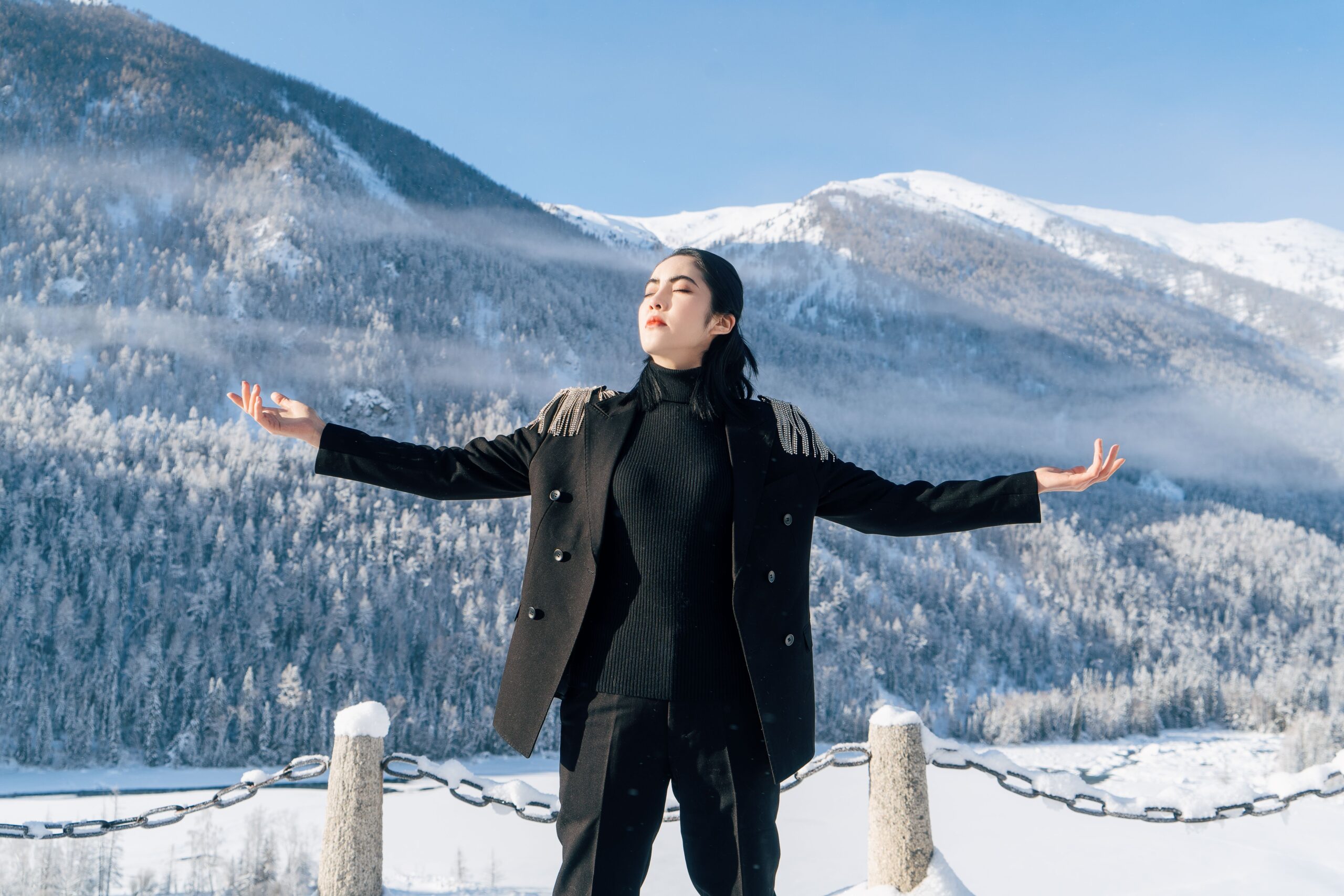 A guest in quiet meditation amid the snowy mountains of a Whitefish, Montana retreat